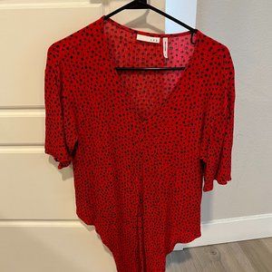 Red top with black polkadots
